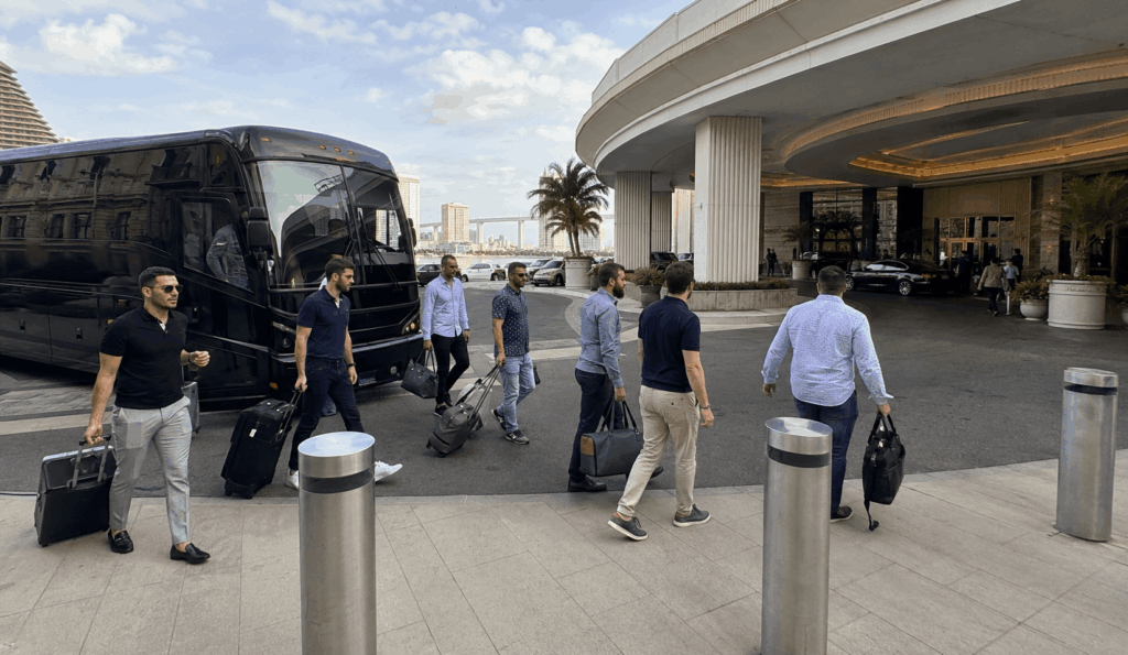party bus dropping off a bachelor group outside an atlantic city casino hotel entrance
