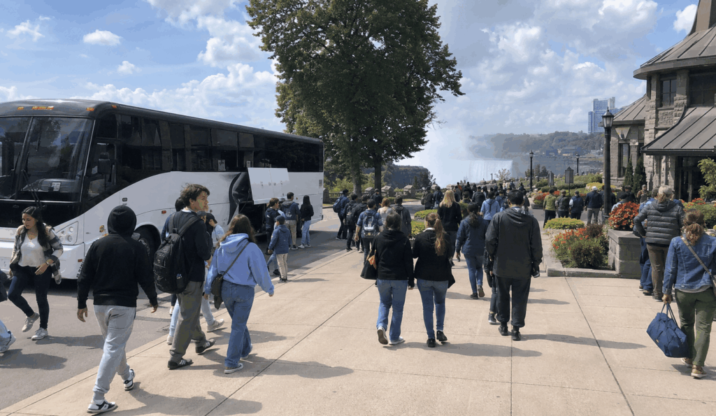 charter bus arriving near niagara falls state park for a group trip from new york city