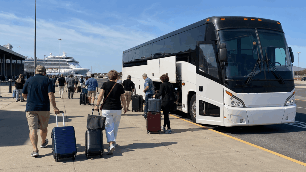 charter bus dropping off cruise passengers with luggage at cape liberty cruise port in bayonne