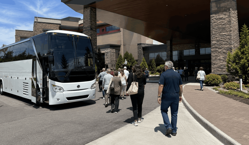 charter bus parked in the dedicated bus parking area after dropping off passengers at resorts world catskills