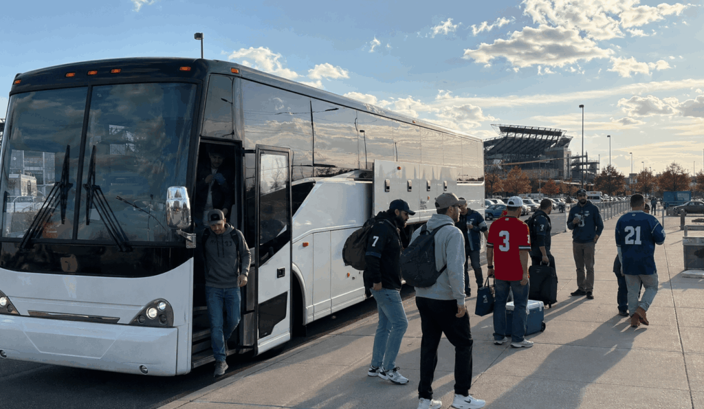 charter bus dropping off sports fans near the south philadelphia sports complex for a philadelphia game day trip